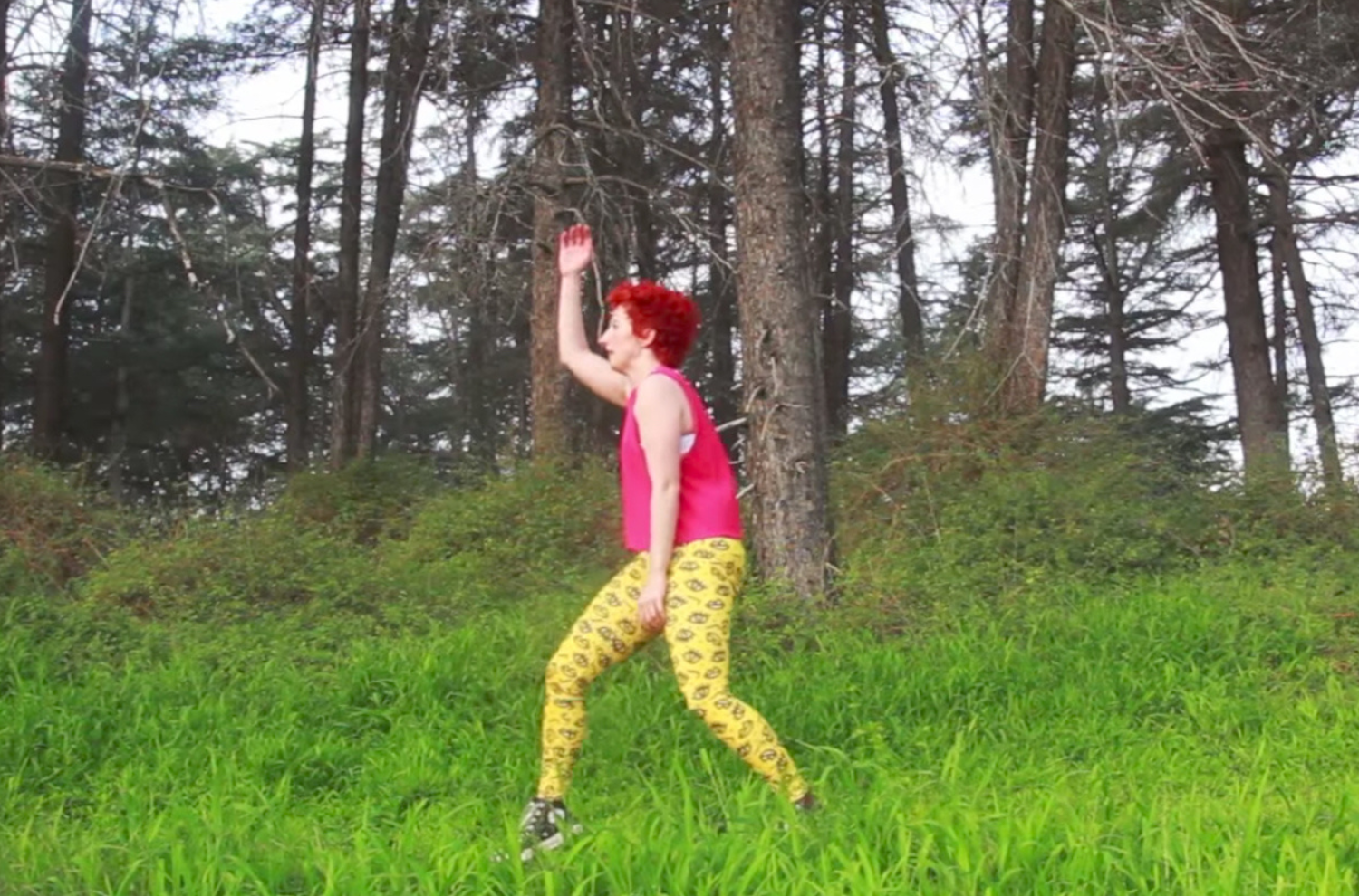 Choreographer Jillian Meyers dancing in the woods