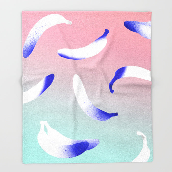 banana print blanket with grey blue white and pink colors