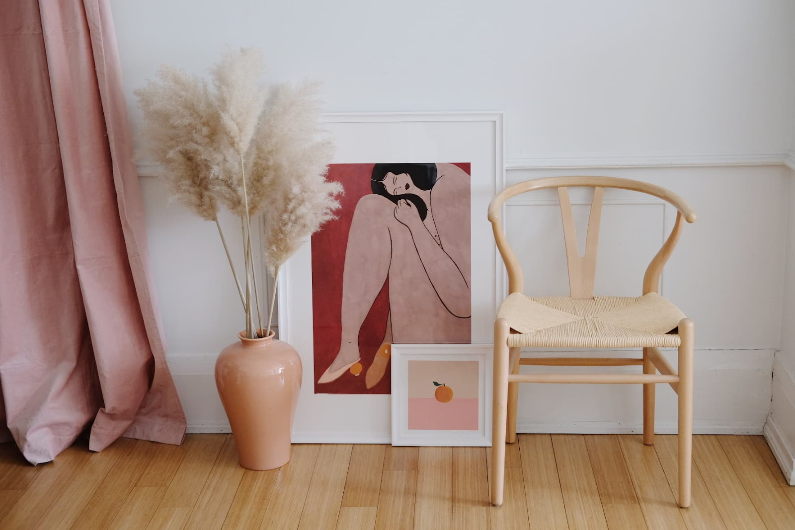 artwork leaning on a wall