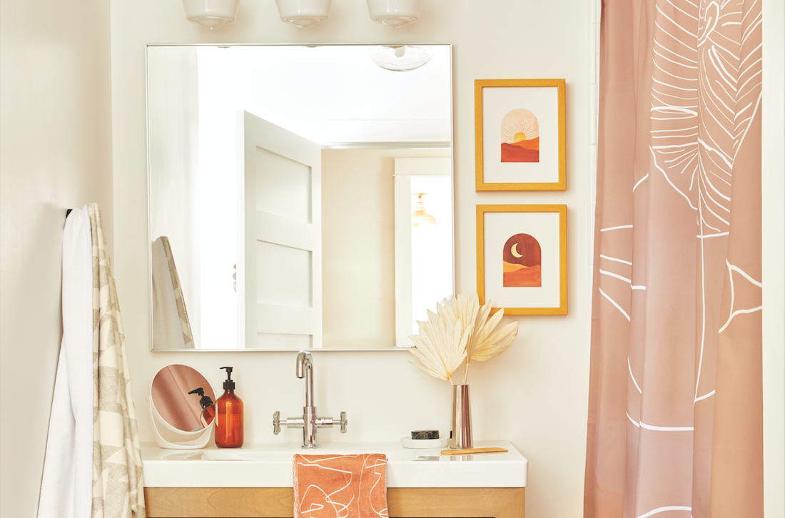 Patterned shower curtain in a sunny bathroom
