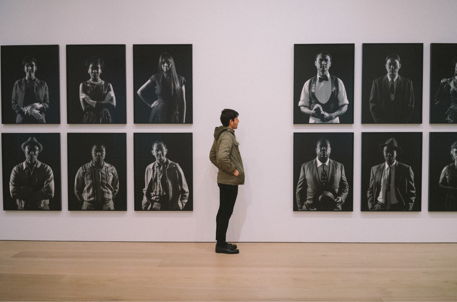 A person looking at art in a gallery