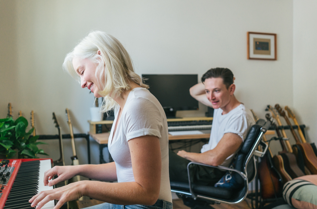 Musicians Ryan Lallier and Emily Moore at home