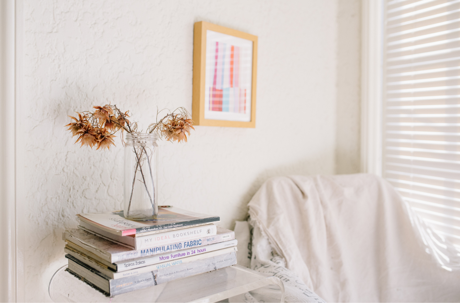 A stack of books in a living room