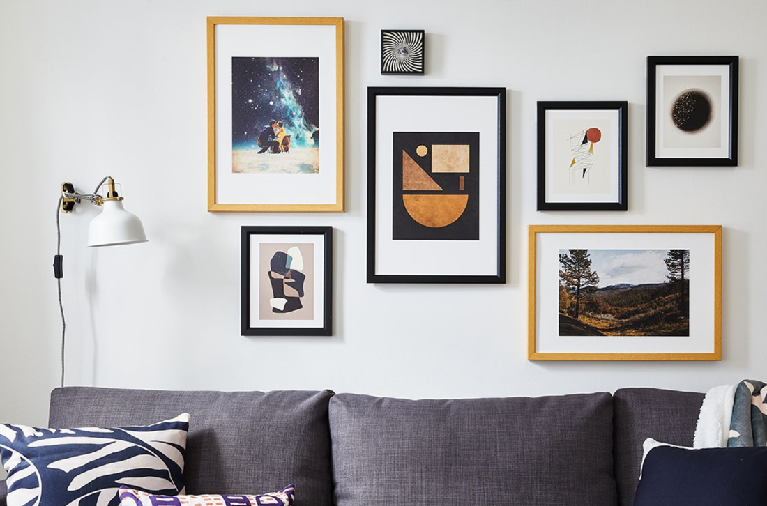 A wall decorated with frames