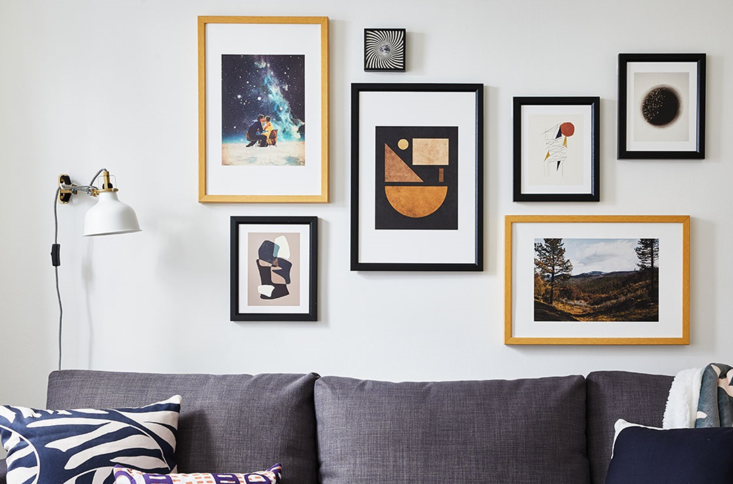 A wall decorated with frames