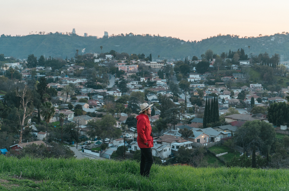 Artist charlie brand on a sunset hill