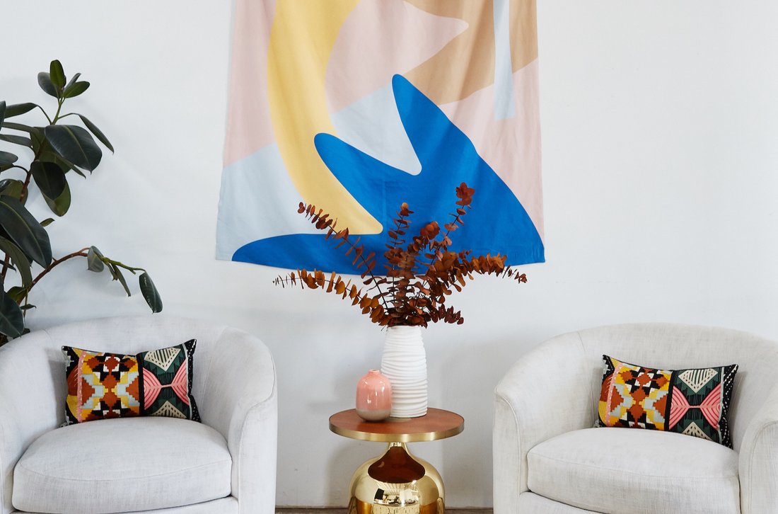 Tapestry hanging up in a living room