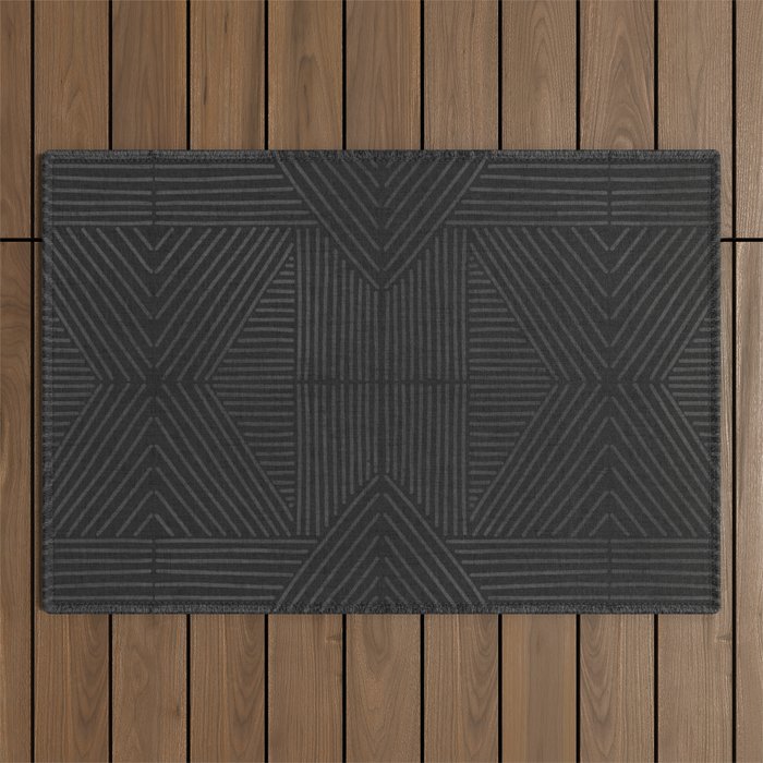 Charcoal grey line work on textured cloth - abstract geometric pattern Outdoor Rug Gallery Image 1