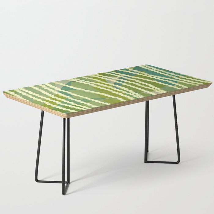 Pikake Lei strands over textured banana leaves Coffee Table Gallery Image 1