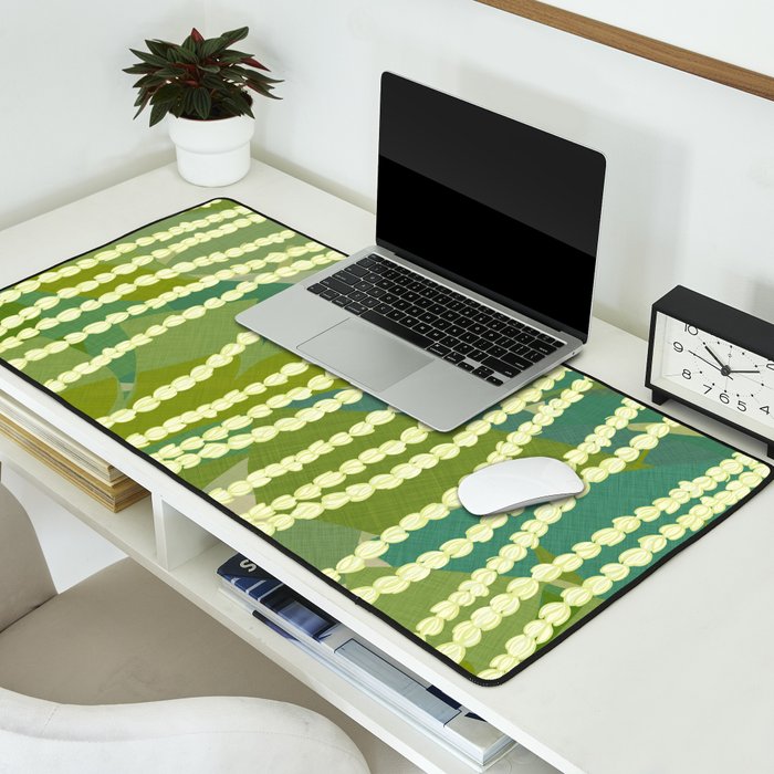 Pikake Lei strands over textured banana leaves Desk Mat Gallery Image 2