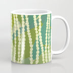 Pikake Lei strands over textured banana leaves Coffee Mug Gallery Image 1