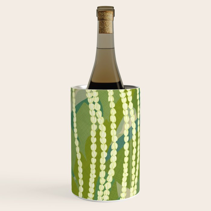 Pikake Lei strands over textured banana leaves Wine Chiller Gallery Image 1