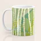 Pikake Lei strands over textured banana leaves Coffee Mug Gallery Image 3