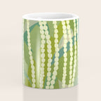 Pikake Lei strands over textured banana leaves Coffee Mug Gallery Image 4