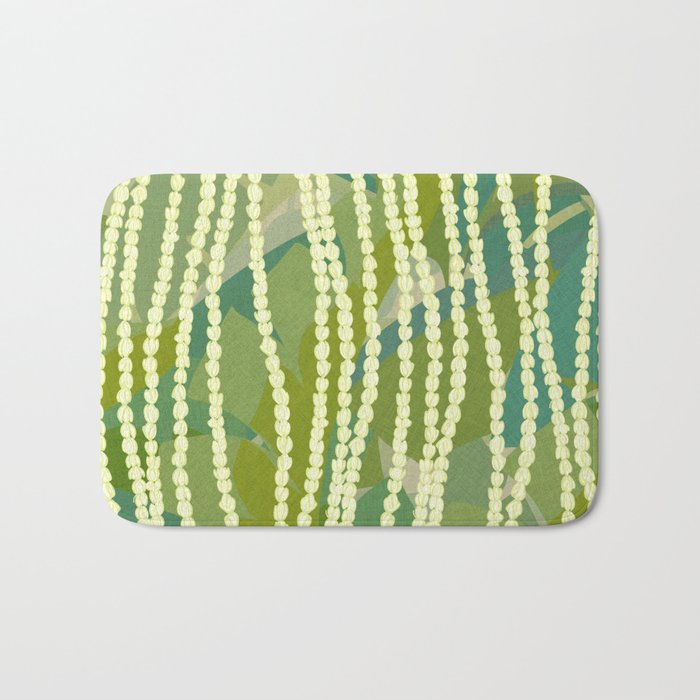 Pikake Lei strands over textured banana leaves Bath Mat Gallery Image 1