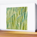 Pikake Lei strands over textured banana leaves Wall Mural Gallery Image 2
