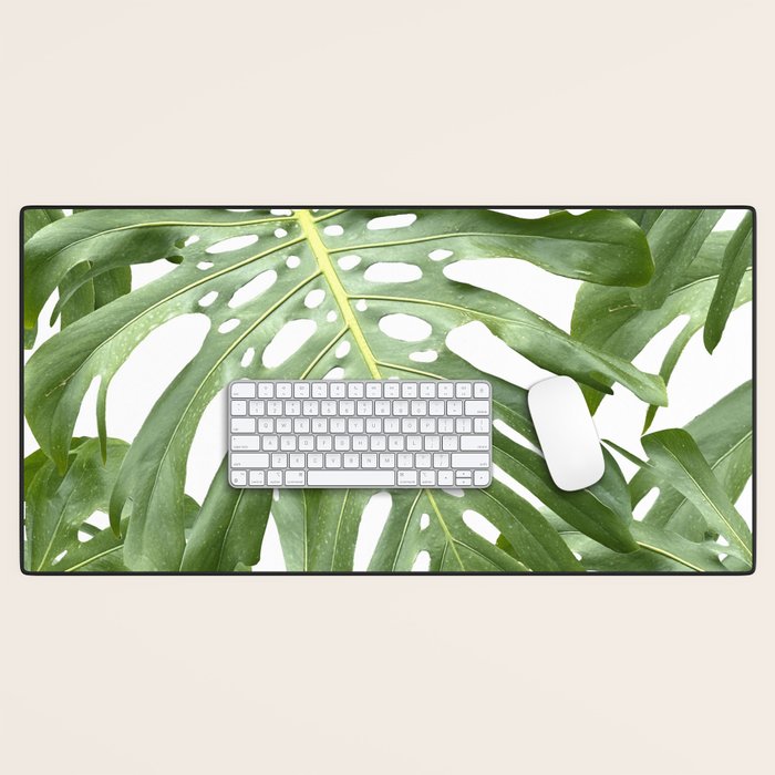 Vibrant tropical foliage on white Desk Mat Gallery Image 1