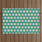 Festive Geometric Star Pattern on Green Outdoor Rug Gallery Image 1
