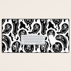 Black and white melted happy face pattern Desk Mat Gallery Image 1