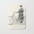 "Leading a Bicycle About" from "Bicycling for Ladies" by Maria E. Ward, 1896 Bath Mat Gallery Image 1