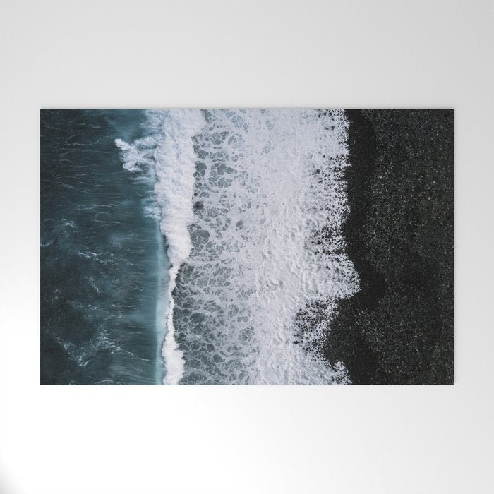 Waves from above on a Black Sand Beach Welcome Mat Gallery Image 1