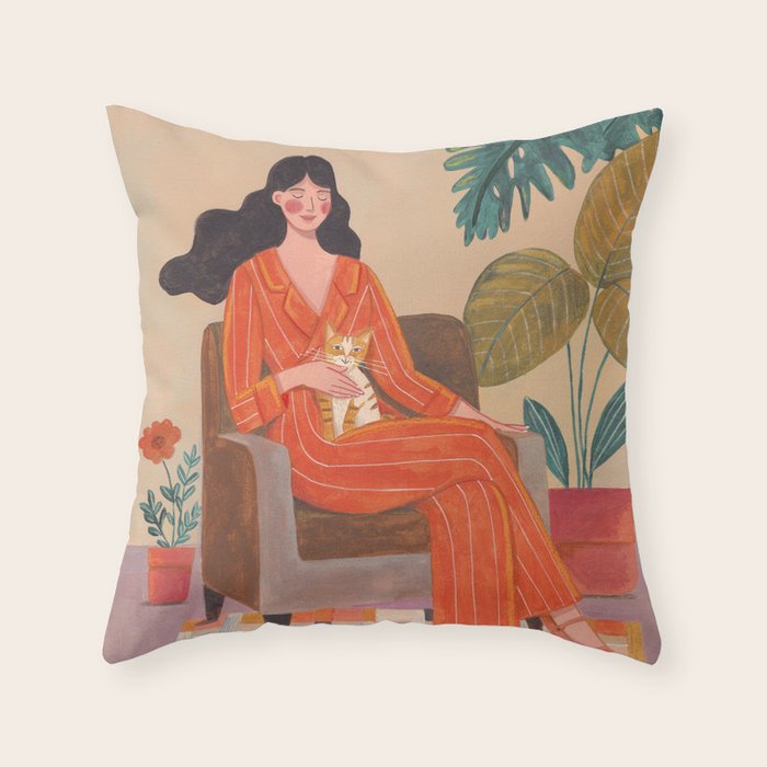 Woman with cat in living room in warm earth tones Throw Pillow Gallery Image 6