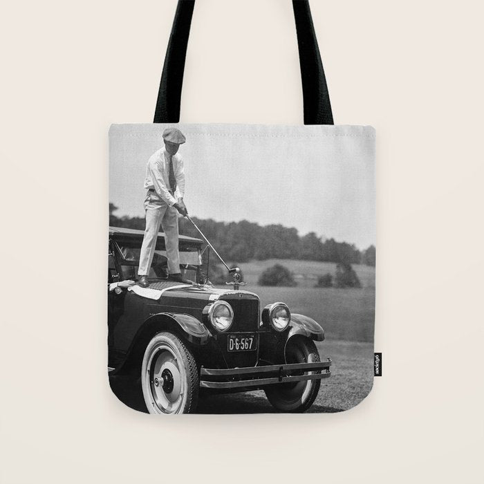 Golfer Teeing Off on Top of Car, Black and White, Old Photo, Vintage Golf Art Tote Bag Gallery Image 1