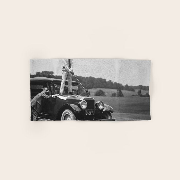 Golfer Teeing Off on Top of Car, Black and White, Old Photo, Vintage Golf Art Bath Towel Gallery Image 1
