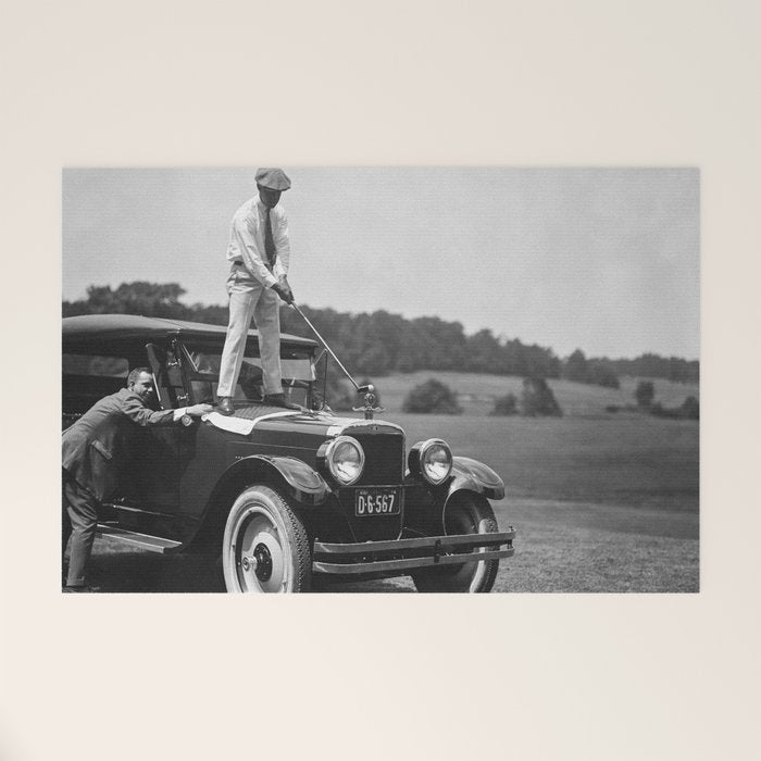 Golfer Teeing Off on Top of Car, Black and White, Old Photo, Vintage Golf Art Welcome Mat Gallery Image 1