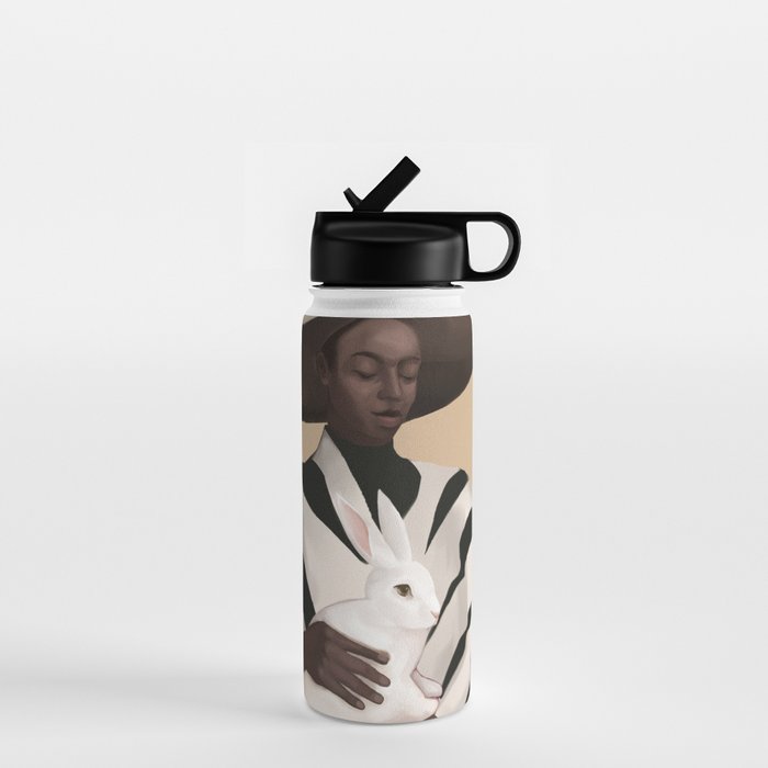 Woman in Stripes Holding a White Rabbit Water Bottle Gallery Image 1
