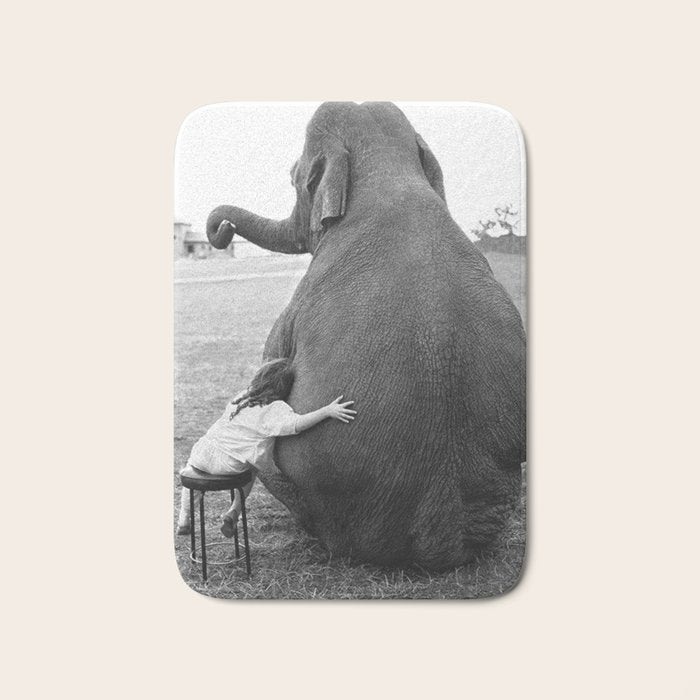 Odd Best Friends, Sweet Little Girl hugging elephant black and white photograph Bath Mat Gallery Image 1