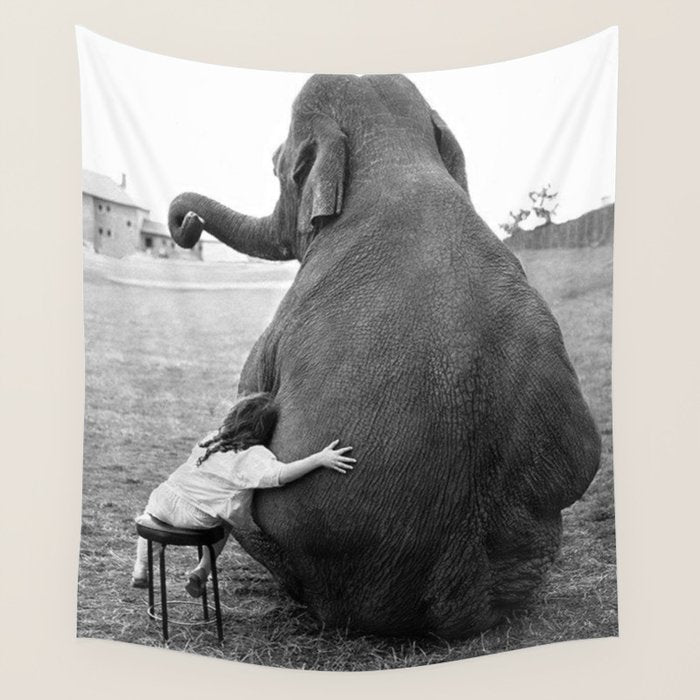 Odd Best Friends, Sweet Little Girl hugging elephant black and white photograph Wall Tapestry Gallery Image 1