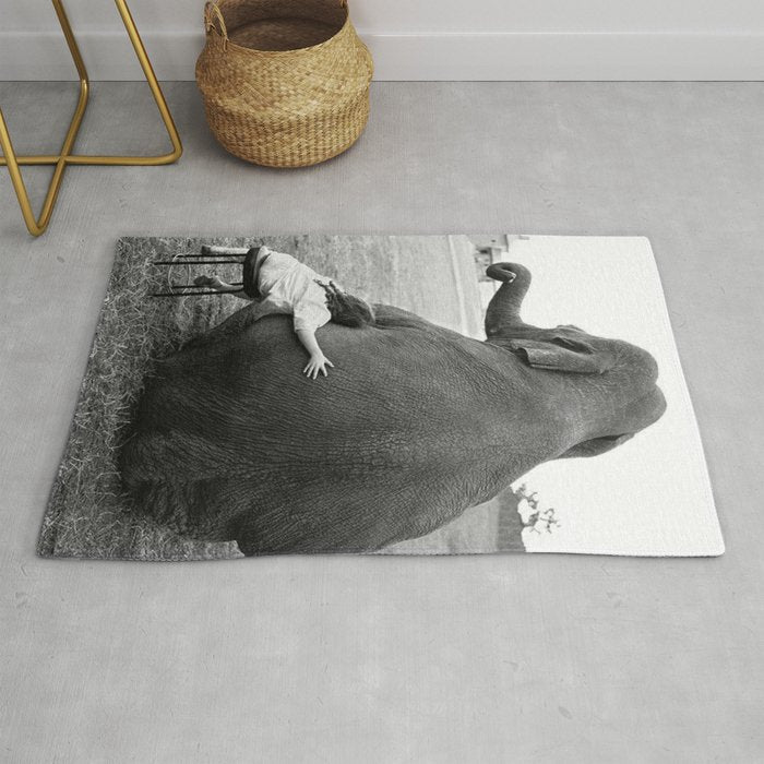 Odd Best Friends, Sweet Little Girl hugging elephant black and white photograph Rug Gallery Image 1