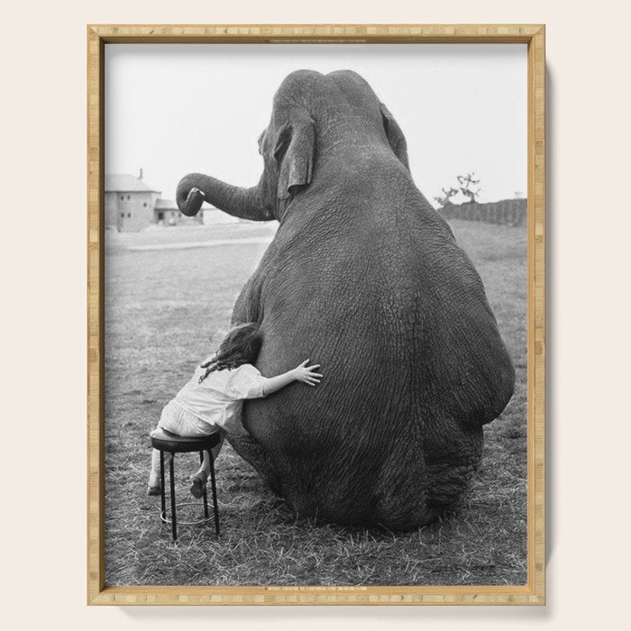 Odd Best Friends, Sweet Little Girl hugging elephant black and white photograph Serving Tray Gallery Image 1