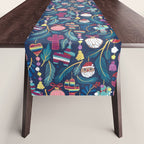 Mexican Christmas Tree // blue background blue pine leaves multicoloured holiday decorations pan dulce balls cacti hearts birds pom-pom garland pinatas santa claus conchas donuts Table Runner Gallery Image 1