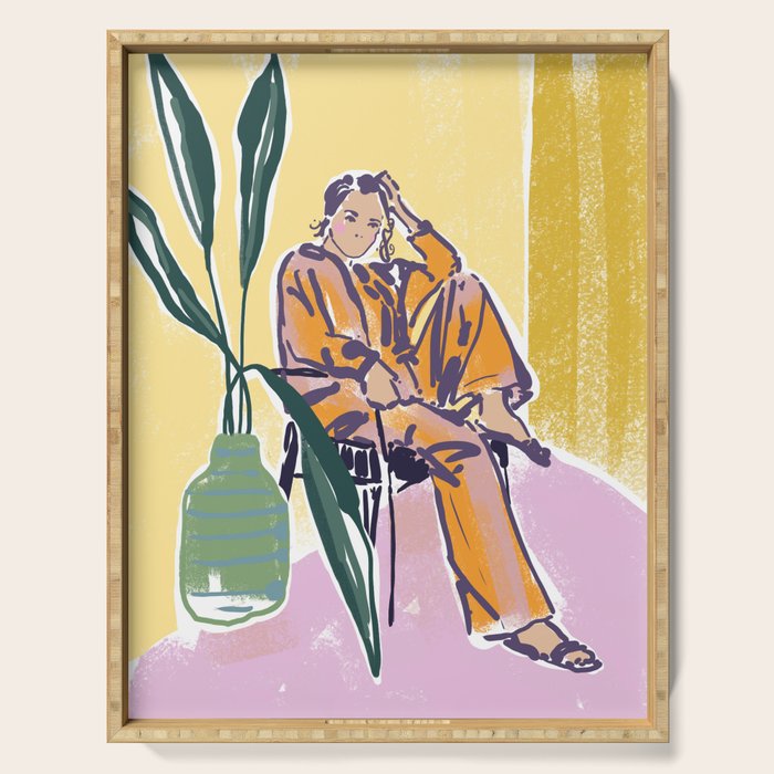 Woman wearing yellow pajamas Serving Tray Gallery Image 1