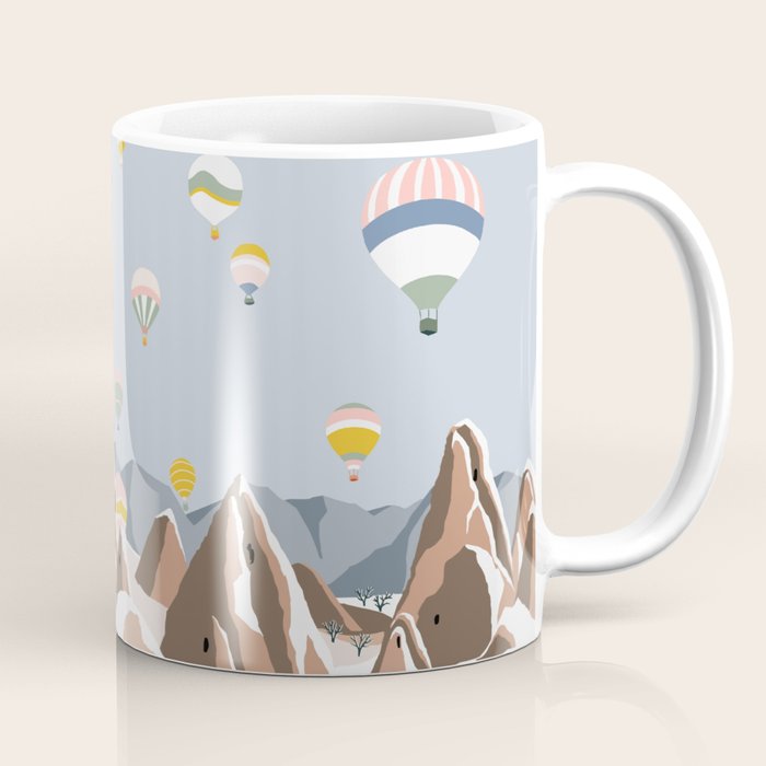 Hot air balloons over snowy mountains Coffee Mug Gallery Image 1