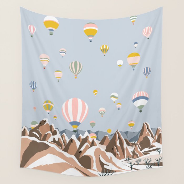 Hot air balloons over snowy mountains Wall Tapestry Gallery Image 1