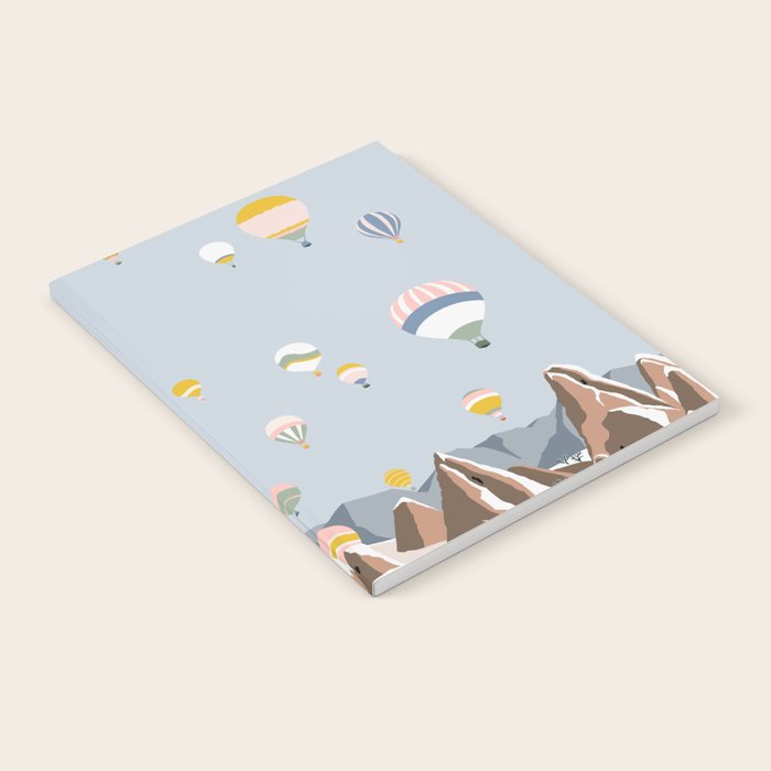 Hot air balloons over snowy mountains Notebook Gallery Image 1