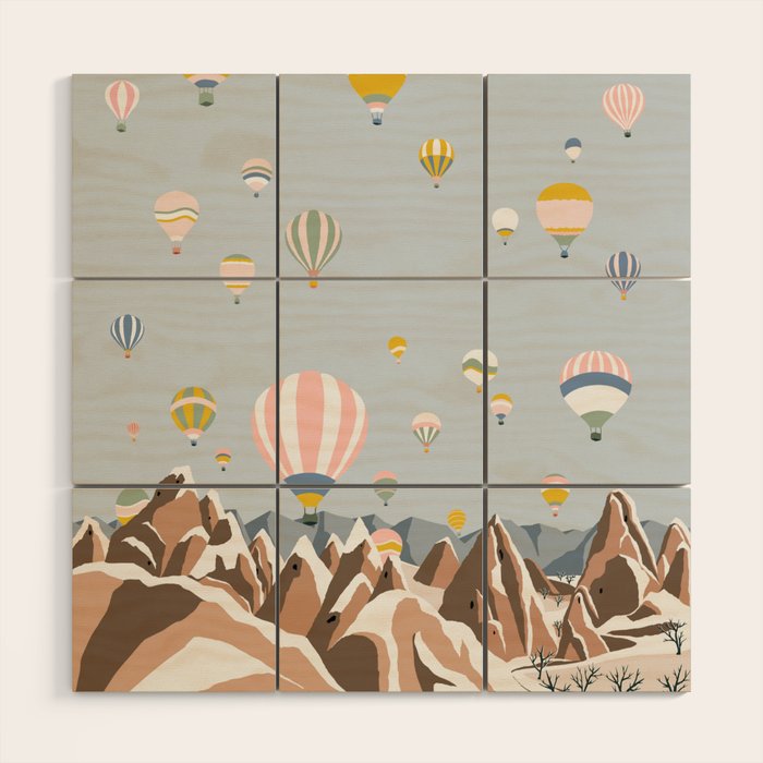Hot air balloons over snowy mountains Wood Wall Art Gallery Image 1