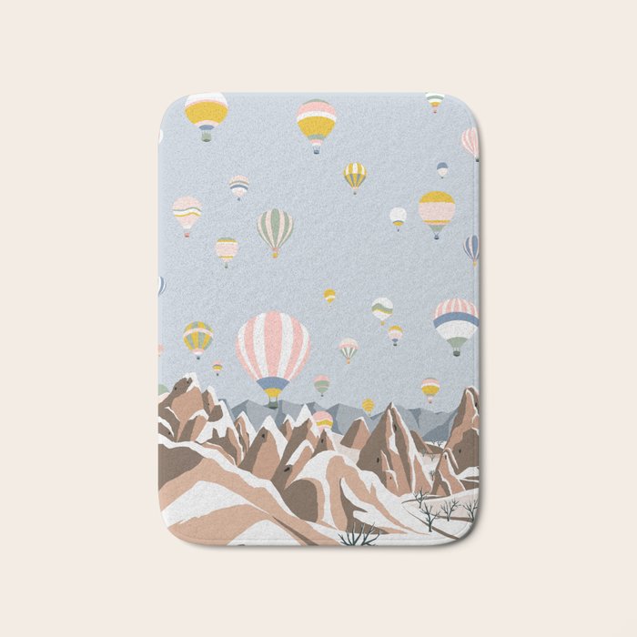 Hot air balloons over snowy mountains Bath Mat Gallery Image 1