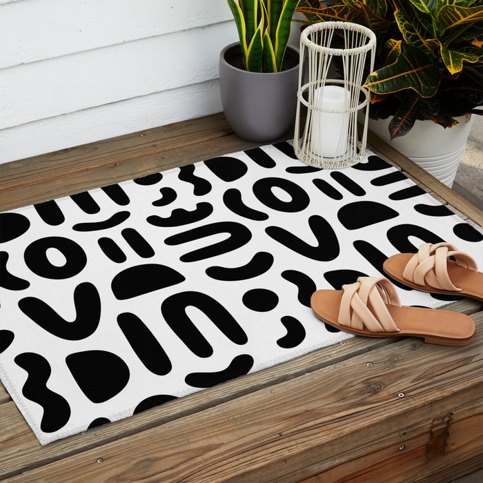 Abstract black and white symbol art pattern Outdoor Rug Gallery Image 2