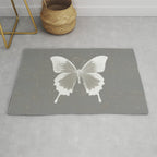 Butterfly on grunge surface Rug Gallery Image 1