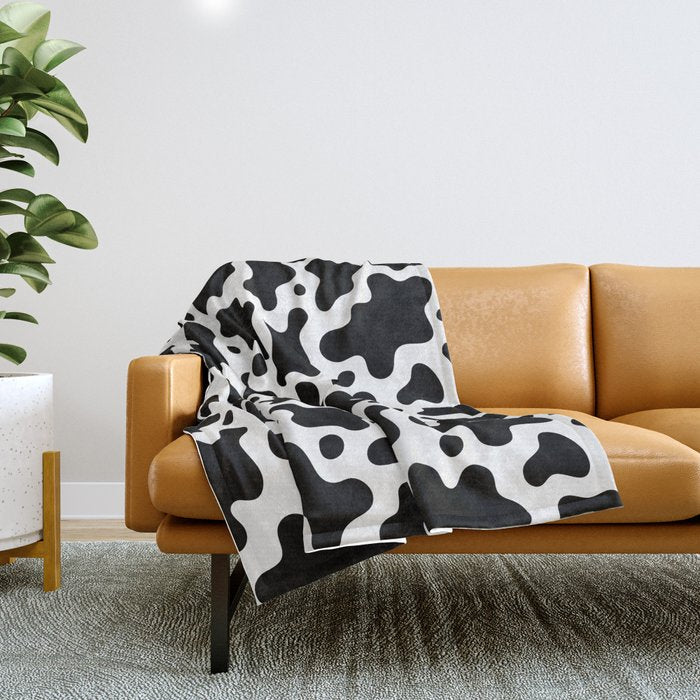 Abstract black and white cow print pattern Throw Blanket Gallery Image 1