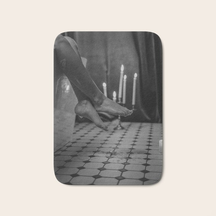 Let it all hang out; female portrait with candles in the bathtub black and white photograph - photography - photographs Bath Mat Gallery Image 1