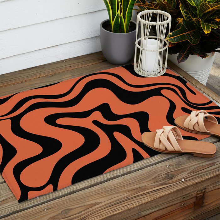 Retro Liquid Swirl Abstract Pattern in Black and Orange Outdoor Rug Gallery Image 2