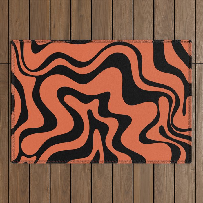 Retro Liquid Swirl Abstract Pattern in Black and Orange Outdoor Rug Gallery Image 1