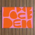 Orange Shapes on Pink Outdoor Rug Gallery Image 1