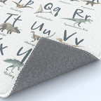 Dinosaur alphabet in muted shades of blue, grey and green Rug Gallery Image 4