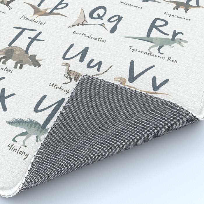 Dinosaur alphabet in muted shades of blue, grey and green Rug Gallery Image 4